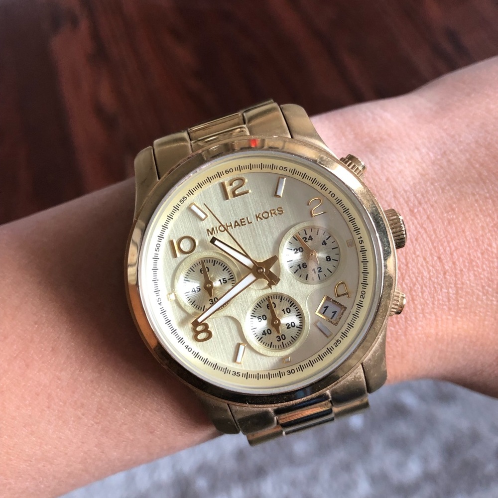 Michael Kors women’s gold watch. FOR SMALL WRISTS!